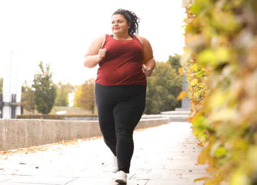 Woman in a larger body on a jog